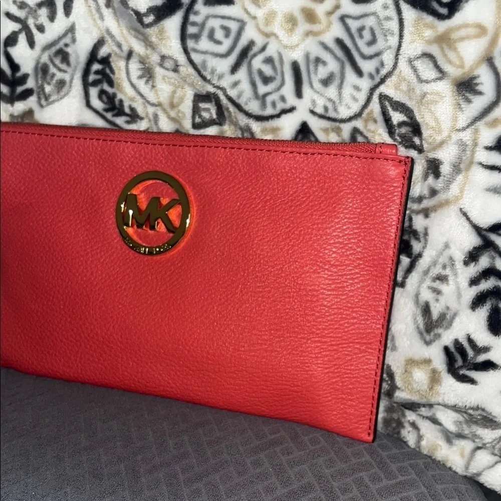 Michael Kors Coral Wristlet with Gold Logo